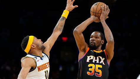 Paul makes 7 3s, Suns beat Nuggets for 7th straight win